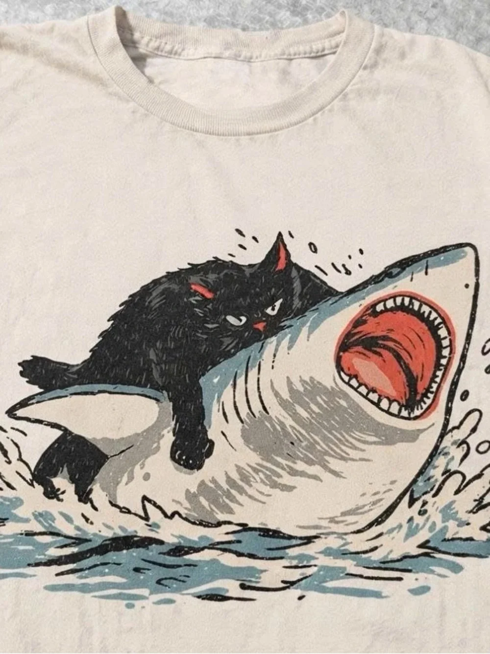 Graphic Tee with Black Cat Riding Shark - Cream